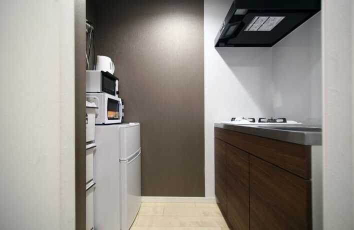 Imagen de la habitación del Hotel Asakusa Koma House. Foto 24