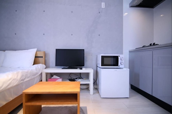 Imagen de la habitación del Hotel Asakusa Koma House. Foto 28