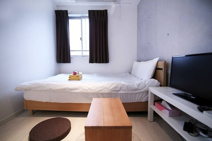 Imagen de la habitación del Hotel Asakusa Koma House. Foto 30