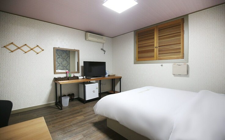 Imagen de la habitación del Hotel Asan Amour. Foto 23