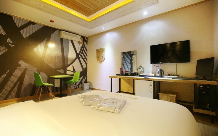 Imagen de la habitación del Hotel Asan Amour. Foto 31