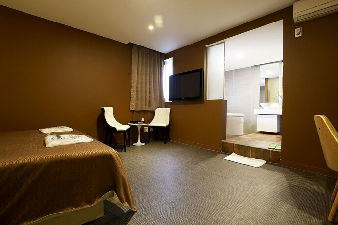 Imagen de la habitación del Hotel Asan Chelsea. Foto 25