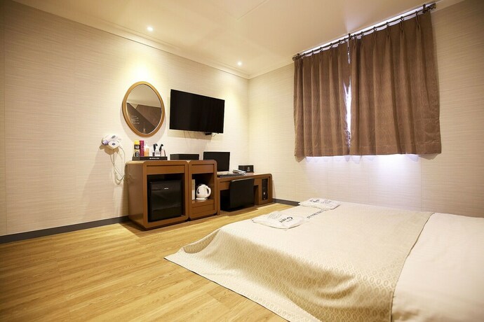 Imagen de la habitación del Hotel Asan Chelsea. Foto 26