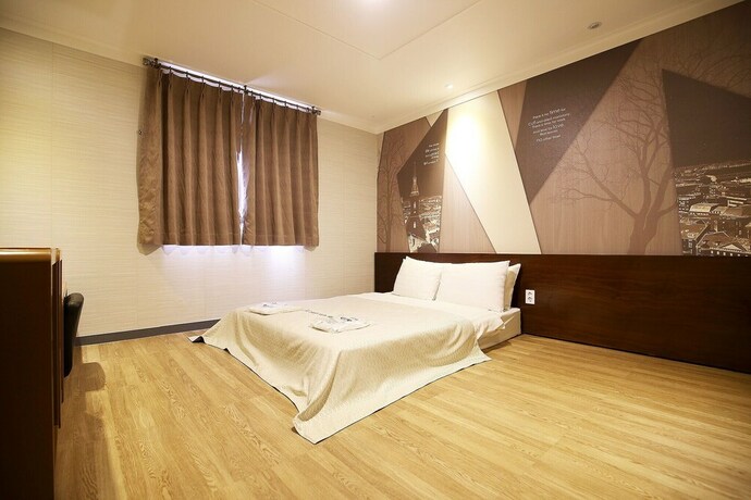 Imagen de la habitación del Hotel Asan Chelsea. Foto 27