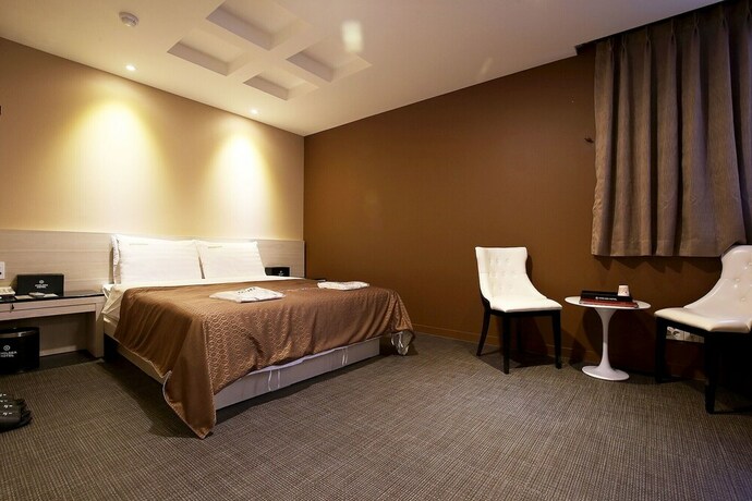 Imagen de la habitación del Hotel Asan Chelsea. Foto 34