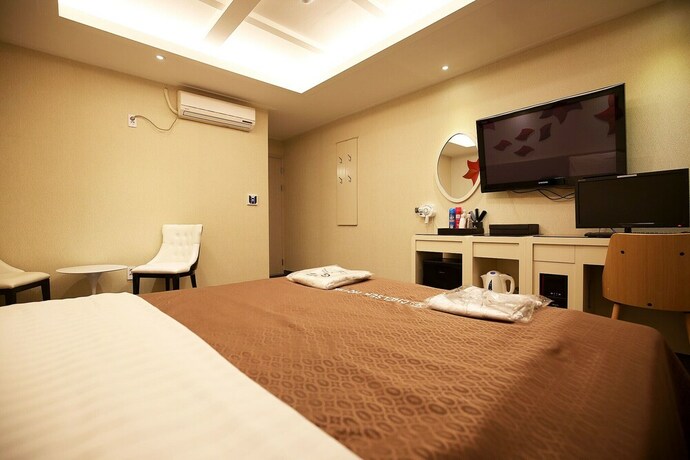 Imagen de la habitación del Hotel Asan Chelsea. Foto 35