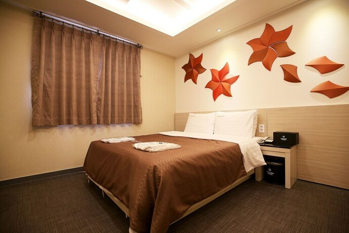 Imagen de la habitación del Hotel Asan Chelsea. Foto 37