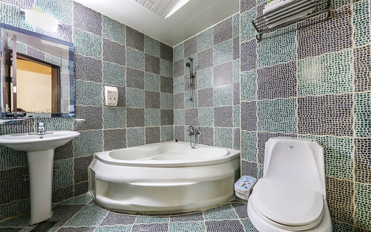 Imagen de la habitación del Hotel Asan Crystal. Foto 11