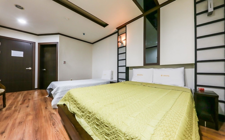Imagen de la habitación del Hotel Asan Crystal. Foto 15