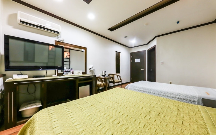 Imagen de la habitación del Hotel Asan Crystal. Foto 16