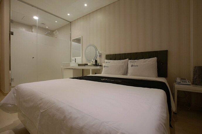 Imagen de la habitación del Hotel Asan Cube. Foto 17