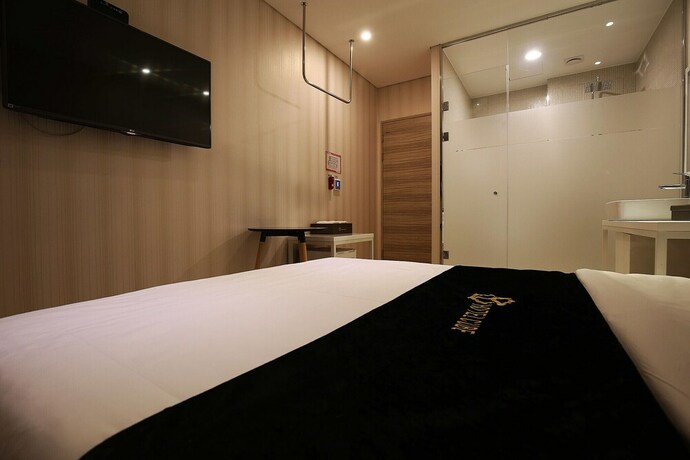 Imagen de la habitación del Hotel Asan Cube. Foto 19