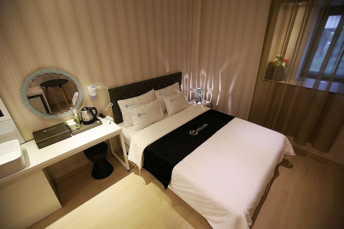 Imagen de la habitación del Hotel Asan Cube. Foto 25