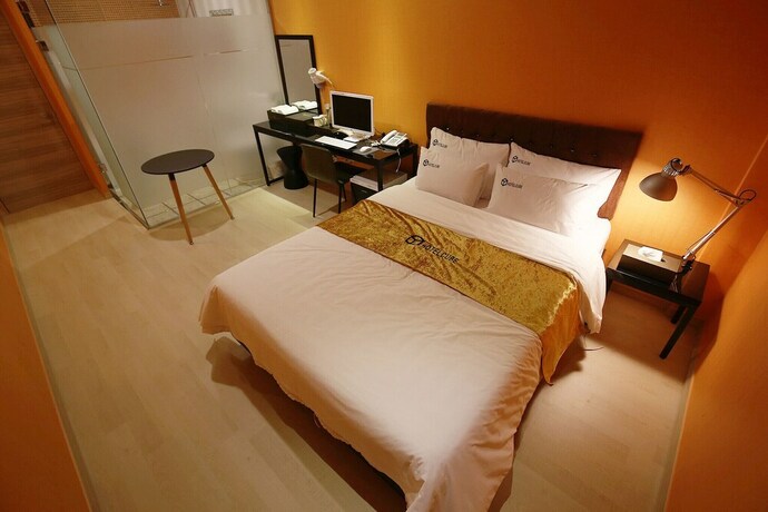 Imagen de la habitación del Hotel Asan Cube. Foto 26