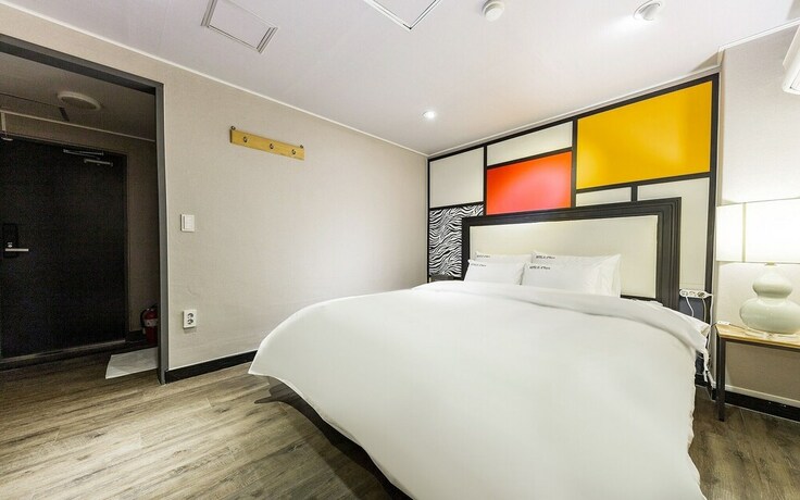 Imagen de la habitación del Hotel Asan E-plus. Foto 17
