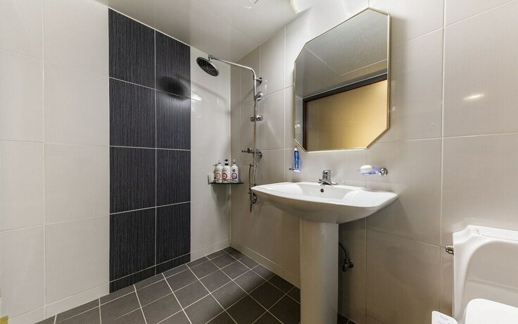 Imagen de la habitación del Hotel Asan E-plus. Foto 18