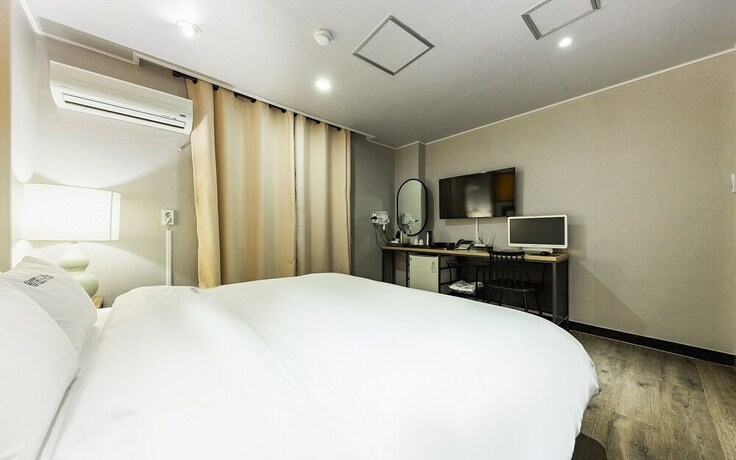 Imagen de la habitación del Hotel Asan E-plus. Foto 25