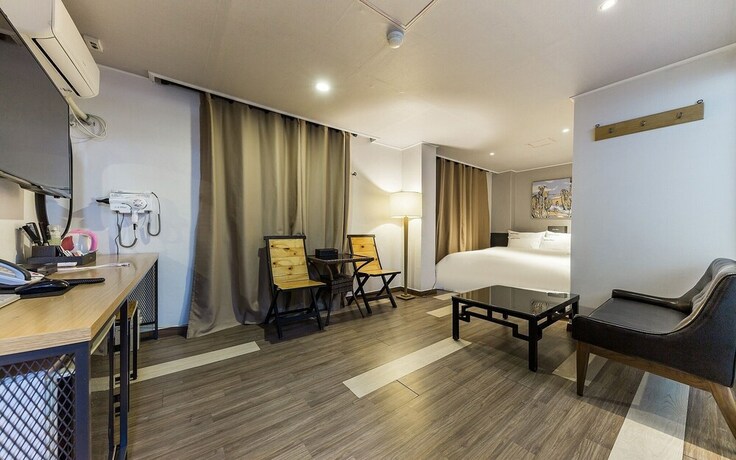 Imagen de la habitación del Hotel Asan E-plus. Foto 27