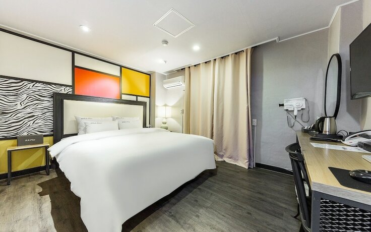 Imagen de la habitación del Hotel Asan E-plus. Foto 28
