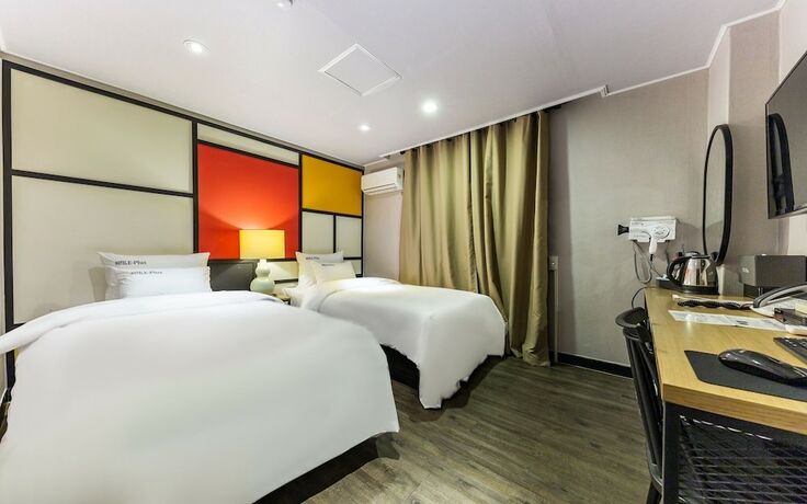 Imagen de la habitación del Hotel Asan E-plus. Foto 32