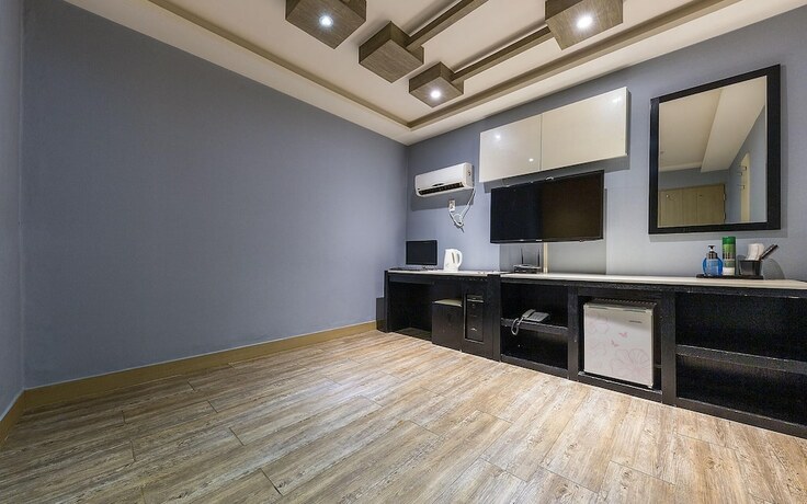 Imagen de la habitación del Hotel Asan ING. Foto 13