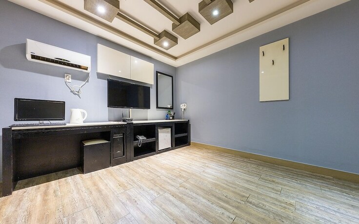 Imagen de la habitación del Hotel Asan ING. Foto 15