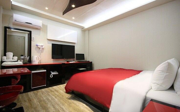 Imagen de la habitación del Hotel Asan ING. Foto 18