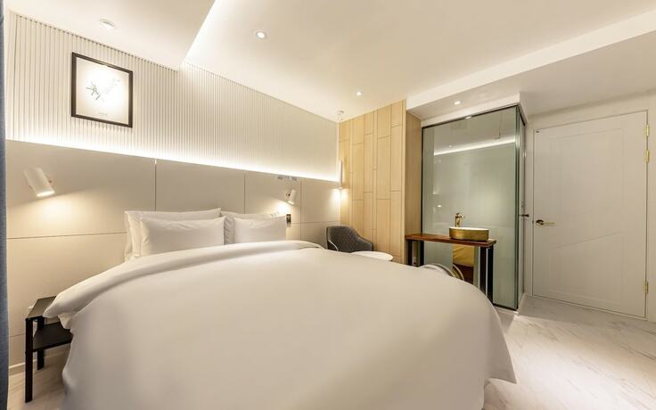 Imagen de la habitación del Hotel Asan Marie. Foto 14