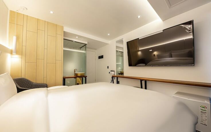 Imagen de la habitación del Hotel Asan Marie. Foto 15