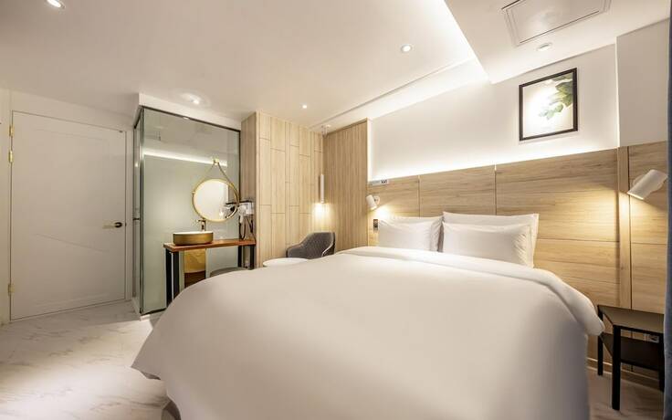 Imagen de la habitación del Hotel Asan Marie. Foto 18