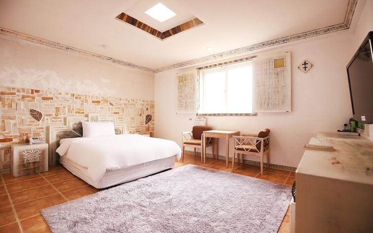 Imagen de la habitación del Hotel Asan Soluna. Foto 2