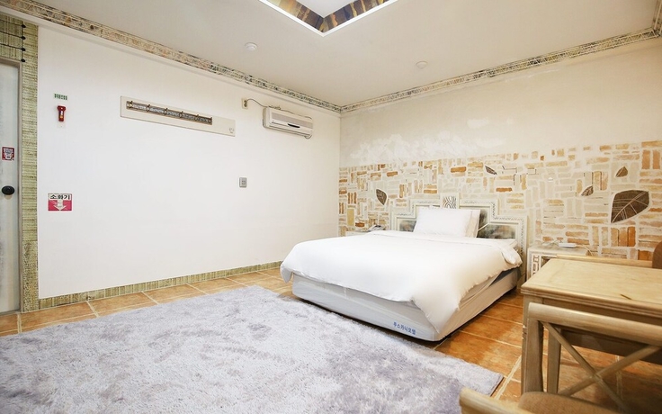 Imagen de la habitación del Hotel Asan Soluna. Foto 4