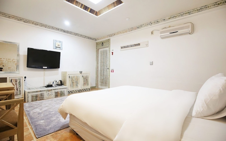 Imagen de la habitación del Hotel Asan Soluna. Foto 6