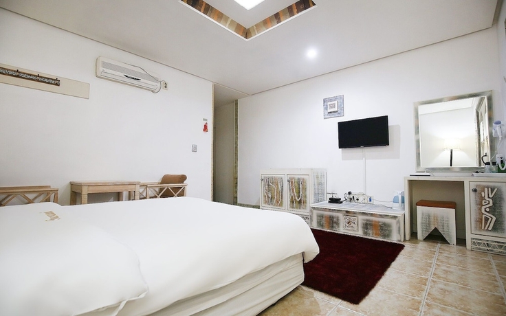 Imagen de la habitación del Hotel Asan Soluna. Foto 10