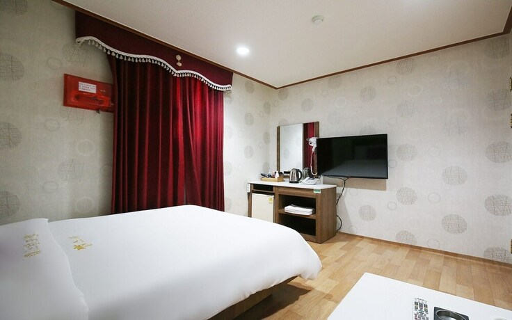 Imagen de la habitación del Hotel Asan Western. Foto 21