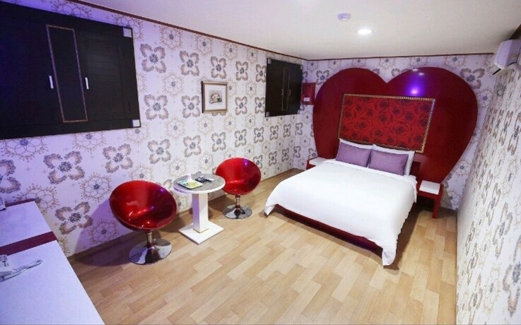 Imagen de la habitación del Hotel Asan Western. Foto 23