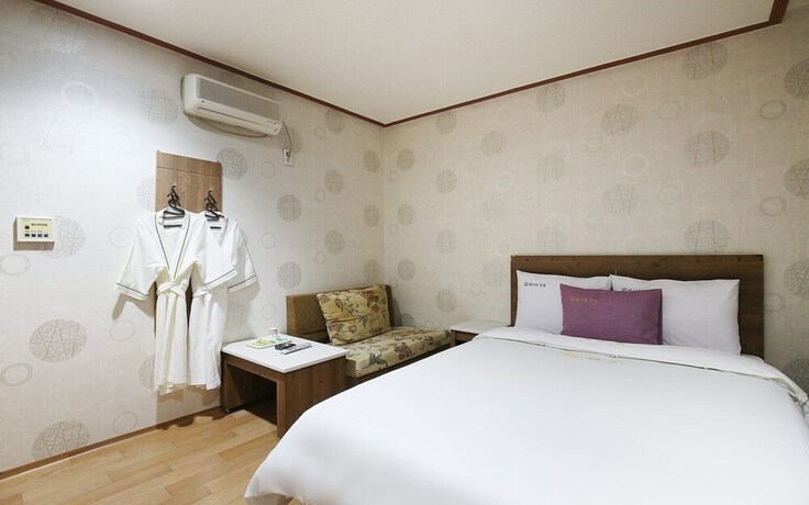 Imagen de la habitación del Hotel Asan Western. Foto 26