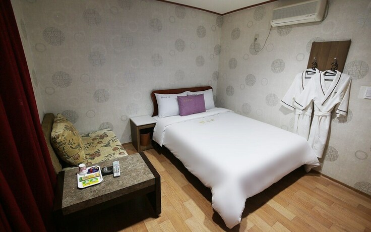 Imagen de la habitación del Hotel Asan Western. Foto 31