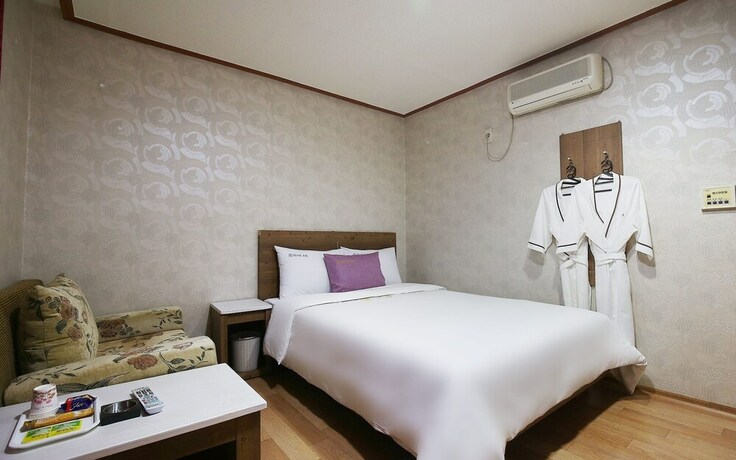 Imagen de la habitación del Hotel Asan Western. Foto 32