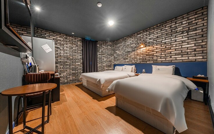 Imagen de la habitación del Hotel Asan Wol. Foto 18