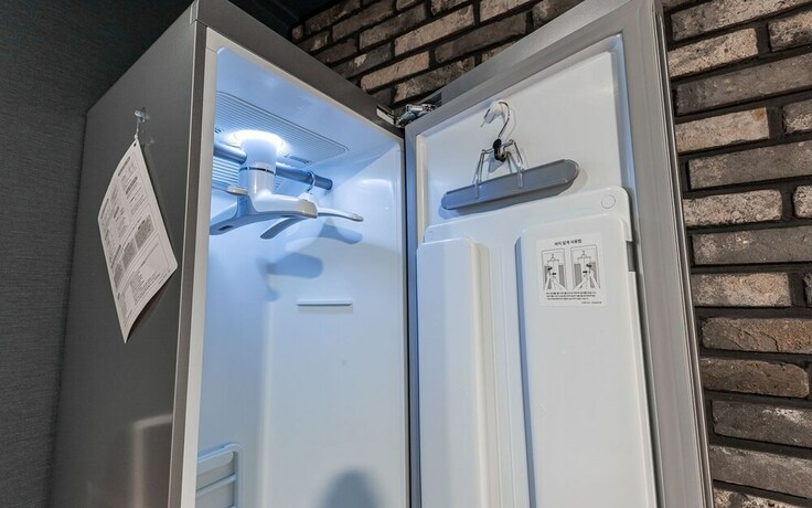 Imagen de la habitación del Hotel Asan Wol. Foto 28