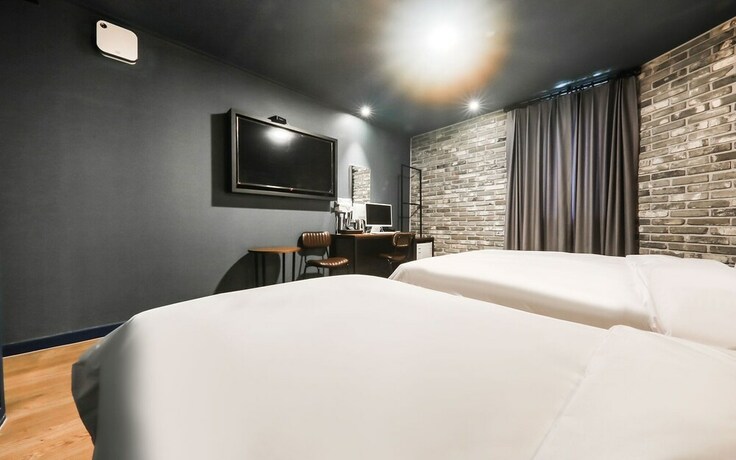 Imagen de la habitación del Hotel Asan Wol. Foto 32