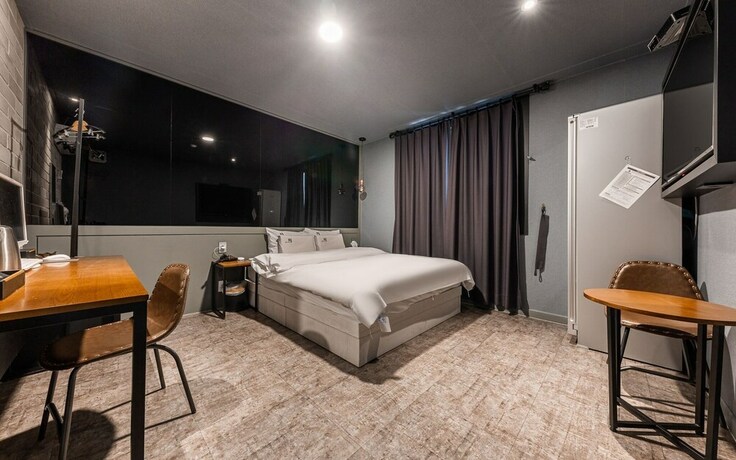 Imagen de la habitación del Hotel Asan Wol. Foto 35