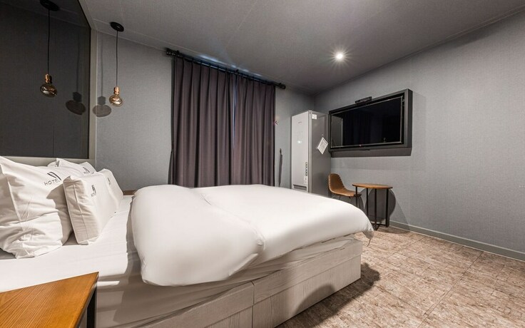 Imagen de la habitación del Hotel Asan Wol. Foto 36