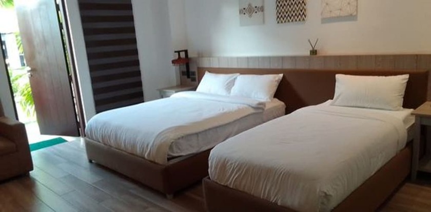 Imagen de la habitación del Hotel Asaricha Tropical Beach Resort. Foto 11
