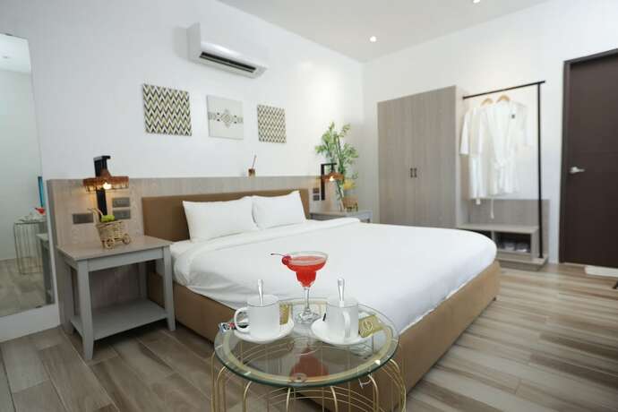 Imagen de la habitación del Hotel Asaricha Tropical Beach Resort. Foto 12