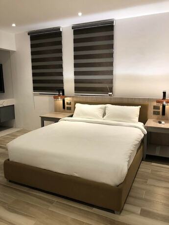 Imagen de la habitación del Hotel Asaricha Tropical Beach Resort. Foto 19