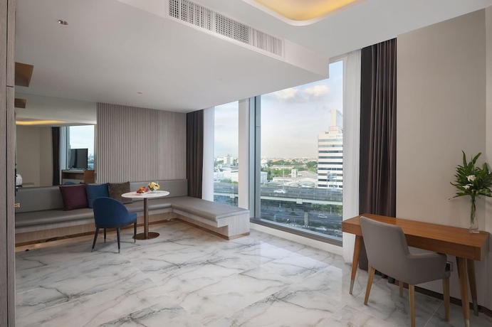 Imagen de la habitación del Hotel Asawin Grand Convention Hotel. Foto 11