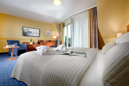 Imagen de la habitación del Hotel Ascari Parkhotel. Foto 7