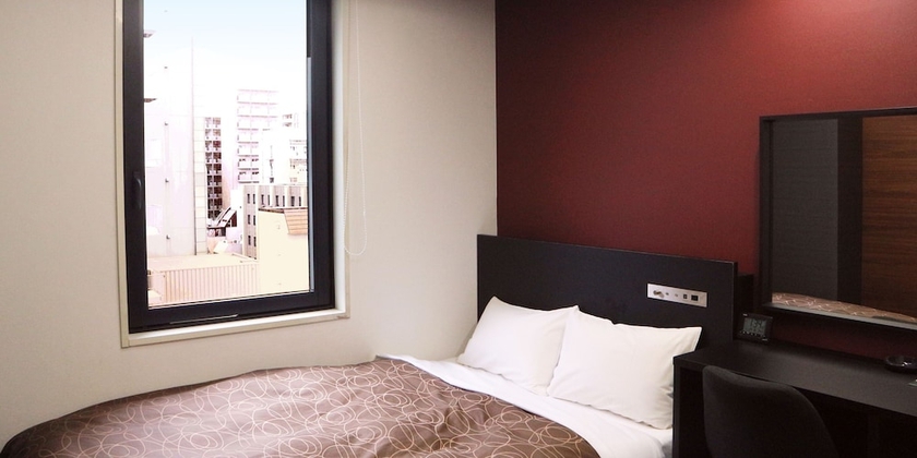 Imagen de la habitación del Hotel Ascent. Foto 10